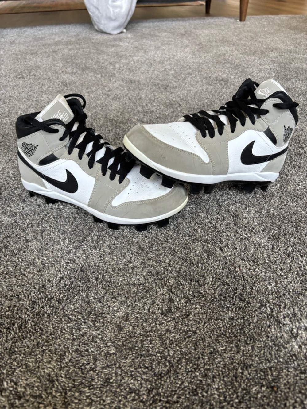 Nike Air Jordan Gray, White, and Black High-Top Cleats